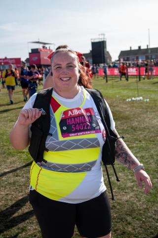Two team blood bike runner smiling at the end of the race