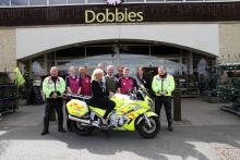 Alan Johnston, Alex McDonald, Dave Hayles, Marc Proctor, Paul Travis Anderson, Walter Irvine, Dean Rookes, Sarah Garbutt, Sean Jamieson and Audrey Garton sat on the Blood Bike.